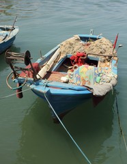 Obraz premium Fishing boat moored along the port of Fethiye in turkey 