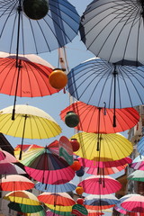 Fototapeta na wymiar Artistic umbrellas along the streets of fethiye in turkey 
