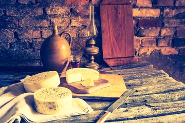 Vintage photo of still life with french goat cheese