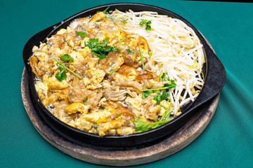 Thai food, fried mussel pancake in hot pan