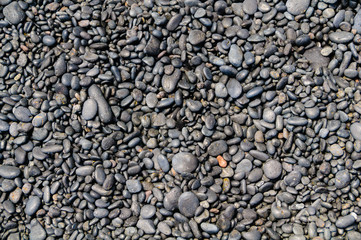 Smooth rounded stones on the beach, Maui, Hawaii, USA
