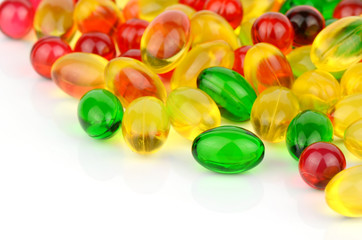 Soft gelatin capsule medicine on white background.