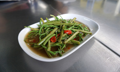 stir fried mimosa with oyster sauce