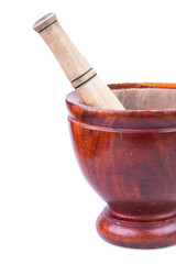 wooden mortar and pestle isolated on white background