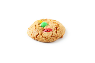 Cookie with colorful candy isolated on white