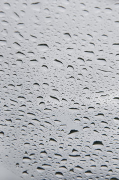 Drops/Many small drops of the rain on the glass

