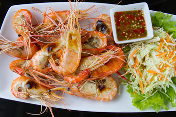 Shrimps freshwater grilled on plate  with seafood sauce.