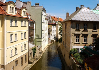Fototapeta na wymiar Summer view of the river Certovka in the old part of Prague
