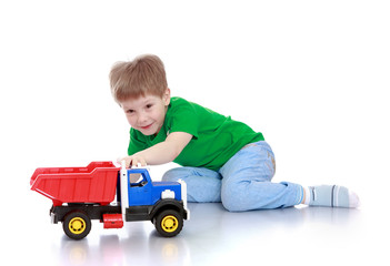 Fototapeta premium The boy with the machine