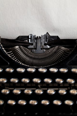  typewriter with aged textured paper sheet