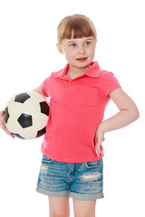 Girl holding soccer ball