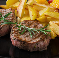 Tender and juicy veal steak medium rare with French fries