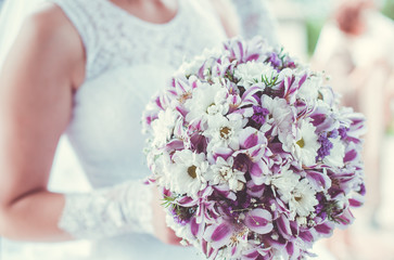Beautiful wedding bridal bouquet in violet tones