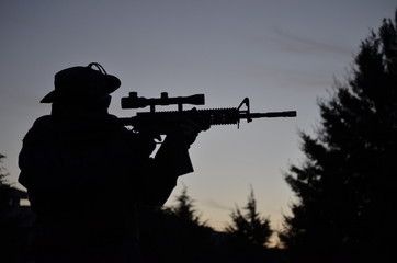Silhouette soldier Airsoft m4 with scope