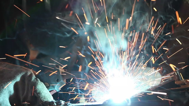 Welder in action. Low depth of focus