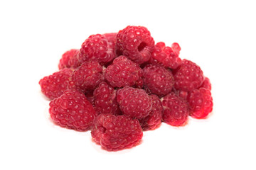 Raspberries over white background.
