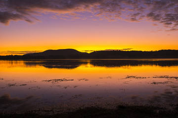 Beautifully rich coloured sunrise at Lake Moogerah in Queensland, Australia