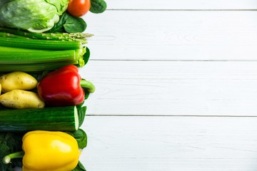 Line of vegetables on table