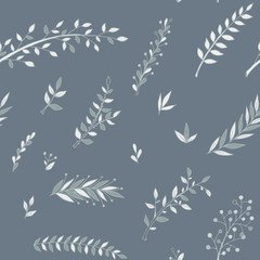 Vector seamless pattern of a variety of hand-drawn leaves and branches. Doodle