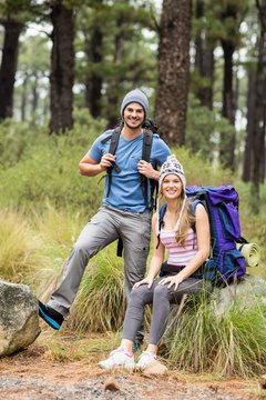 Portrait of a young smiling hiker couple