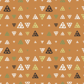Vector seamless pattern of colored triangles drawn by hand