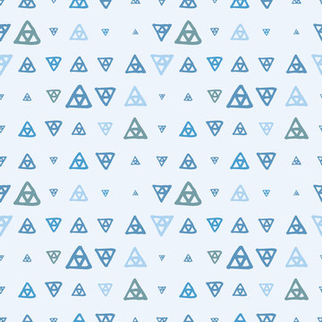 Vector seamless pattern of colored triangles drawn by hand