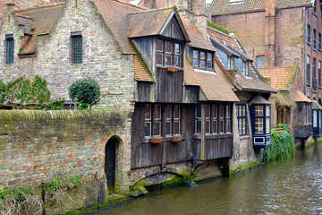 Old houses by the canal in Bruges, Belgium