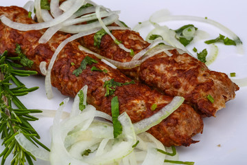 Kebab with onion rings