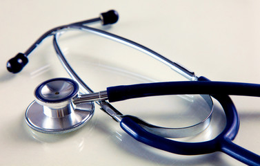 Medical stethoscope in white background
