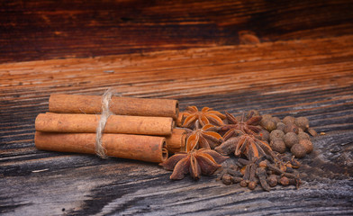 Spices lying on a wooden surface