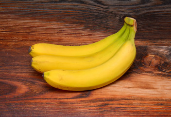 Bananas on wooden background