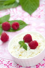 Fresh cottage cheese and ripe raspberries