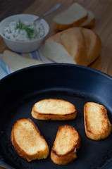 Toasts in a pan