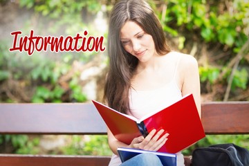 Obraz premium Information against pretty student studying outside on campus