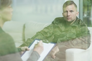Troubled soldier during psychotherapy session