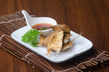 japanese cuisine. fried fish on the background