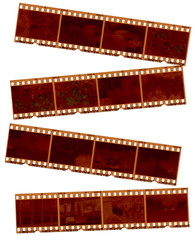 Randomly placed 35mm negative strips on a white background.