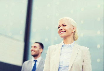 close up of smiling businessmen