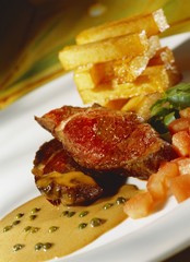 Beef steak with pepper sauce and chips