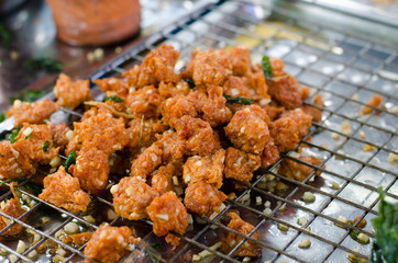 Fried fish cakes with Alpinia nigra burrt plant