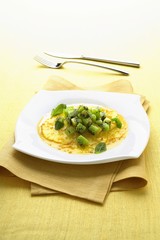 Pineapple carpaccio with diced kiwi fruit