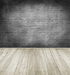 emty room with dark brick wall