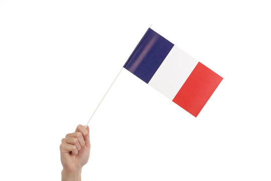 main femme tenant petit drapeau fran&ccedil;ais 