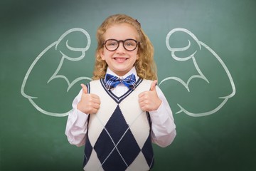 Composite image of cute pupil with thumbs up