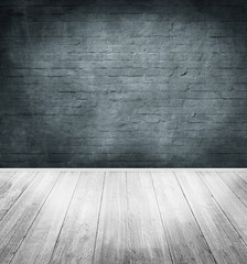 emty room with dark brick wall