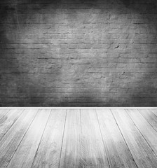 emty room with dark brick wall