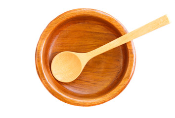 Empty wooden plate with wooden spoon isolated on white background.