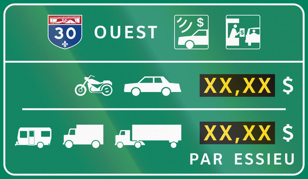 Guide and information road sign in Quebec, Canada - Fees for different vehicle types. Translations: Ouest - West, Par essieu - Per axle