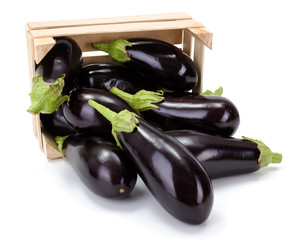 Eggplants (Solanum melongena) in wooden crate