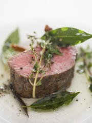 Beef fillet with bay leaves and thyme